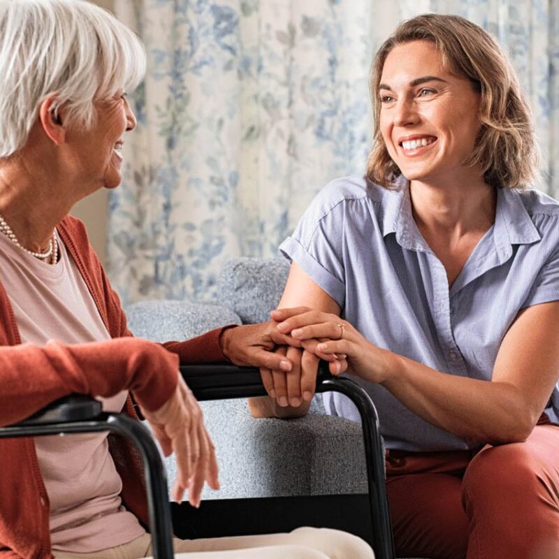 Caregiver Support - elderly patient with a friendly caregiver