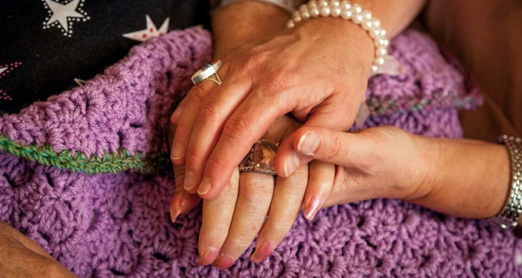 hospice and palliative doctor with patient