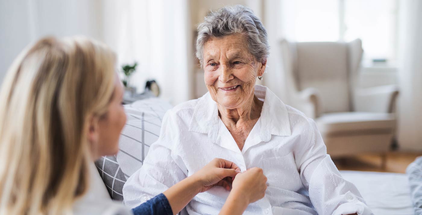 elderly hospice patient with caring nurse