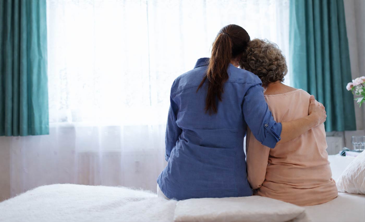 complex illness patient talking with nurse